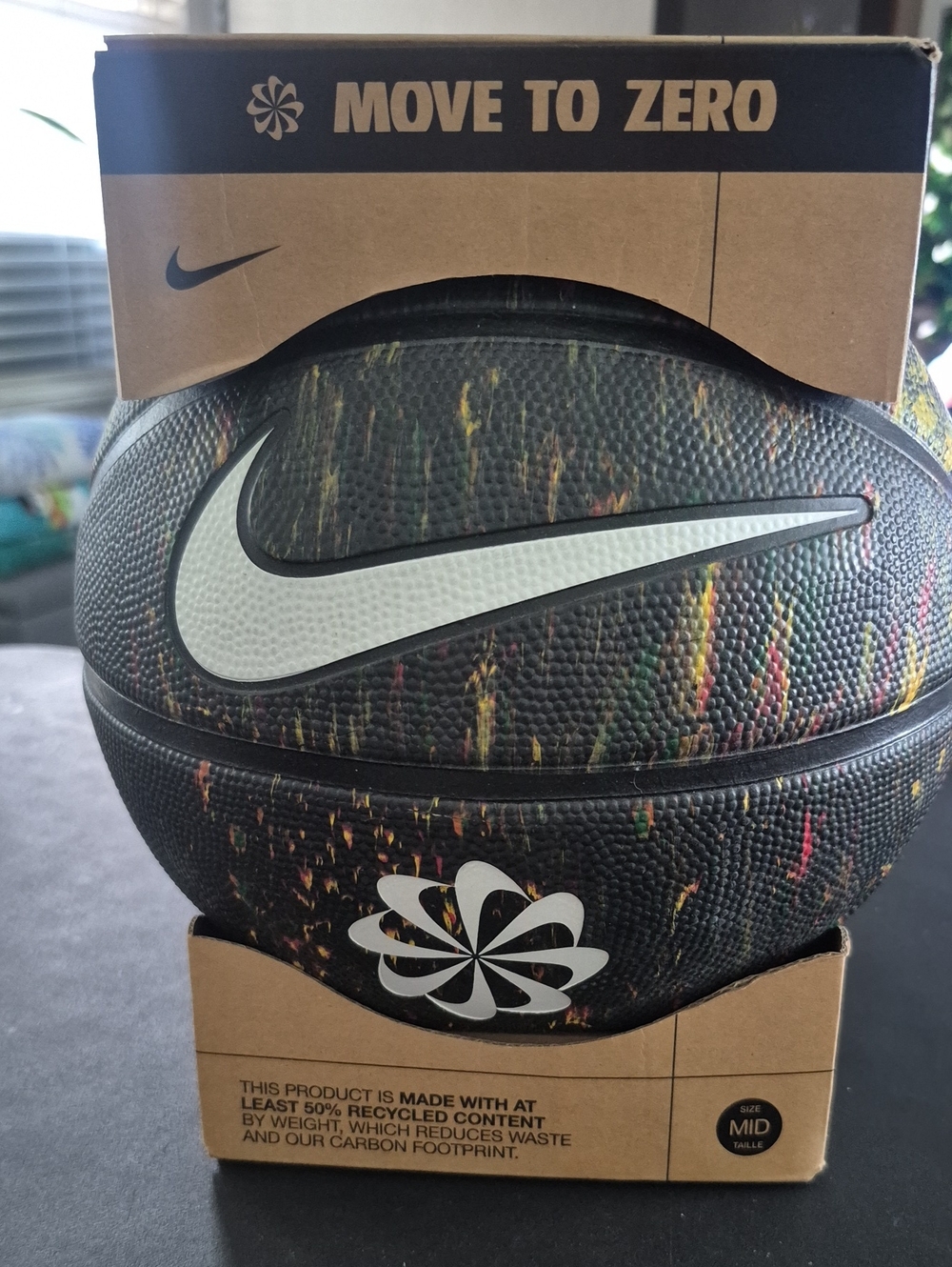 Nike Black Basketball with White Swoosh and Multicolor Specks